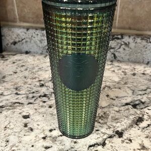 Sage green gridded Starbucks cup